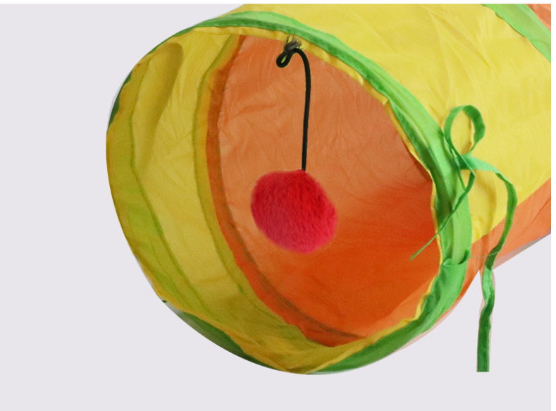 Tunnel entrance with pom-pom ball