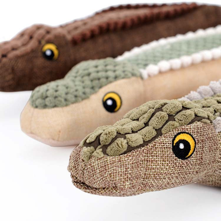 Close-up of plush crocodile heads